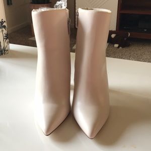 White zip up high heel booties